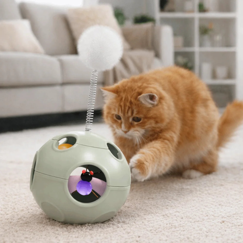 Auto-Rotating Spring Cat Toy with Feather & Bell — Self-Righting Tumbler